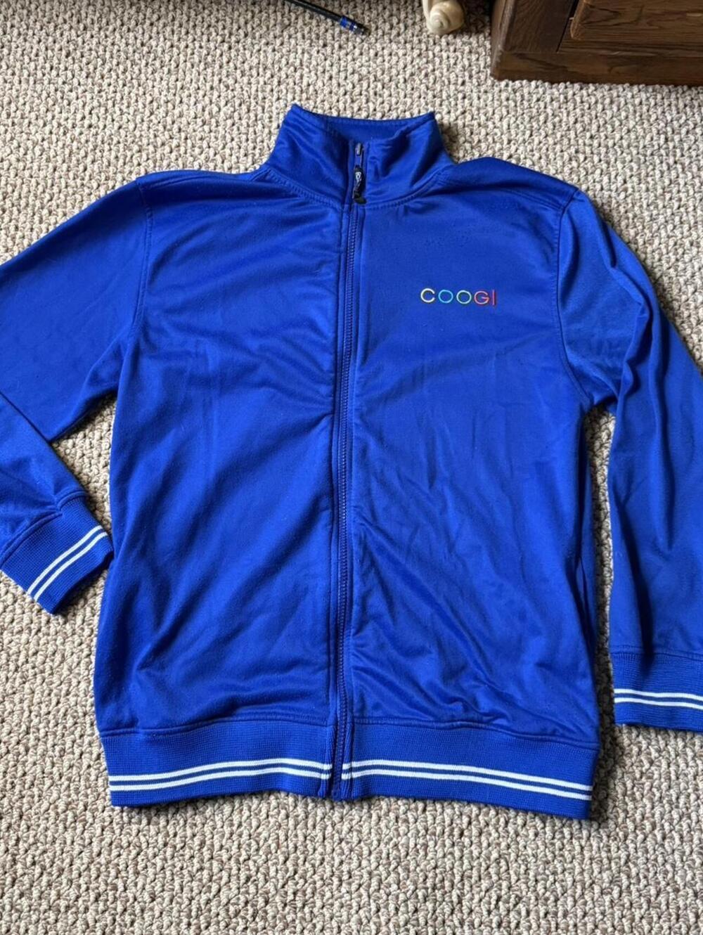 Bright blue and white vintage Coogi zip up jacket